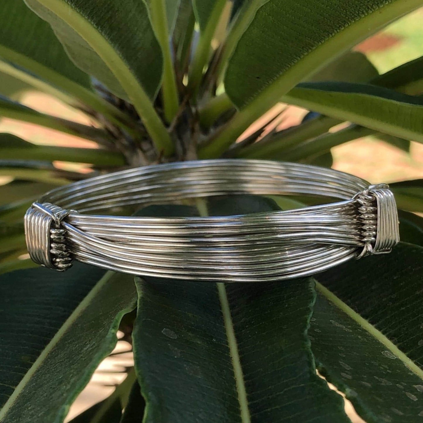 Two Knot Nine Strand Silver Elephant Knot Bangle
