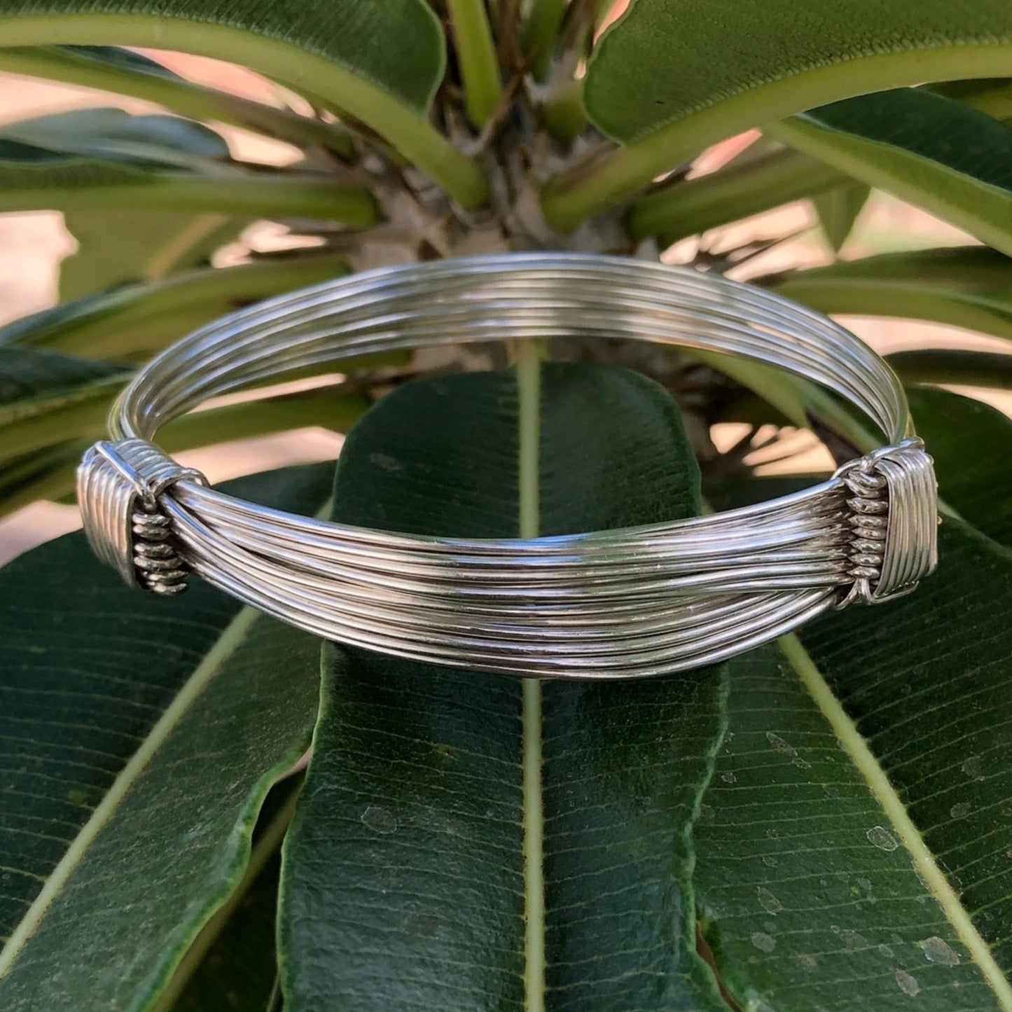 Two Knot Nine Strand Silver Elephant Knot Bangle