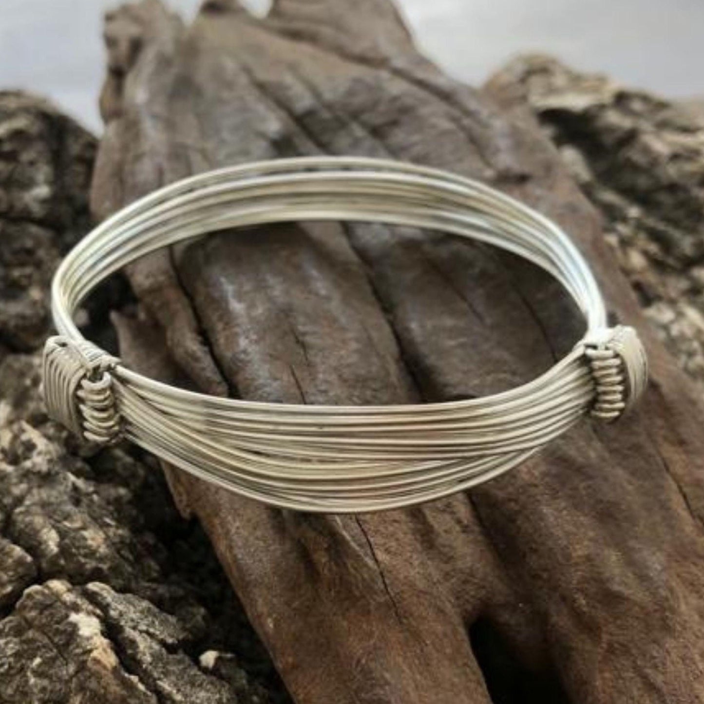 Two Knot Nine Strand Silver Elephant Knot Bangle