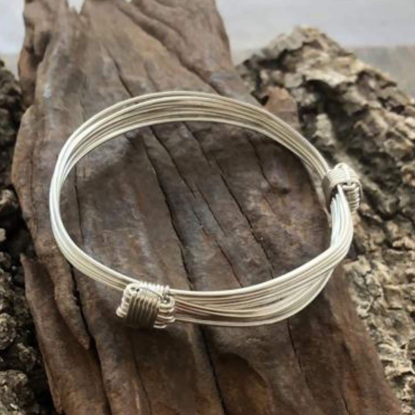 Two Knot Nine Strand Silver Elephant Knot Bangle