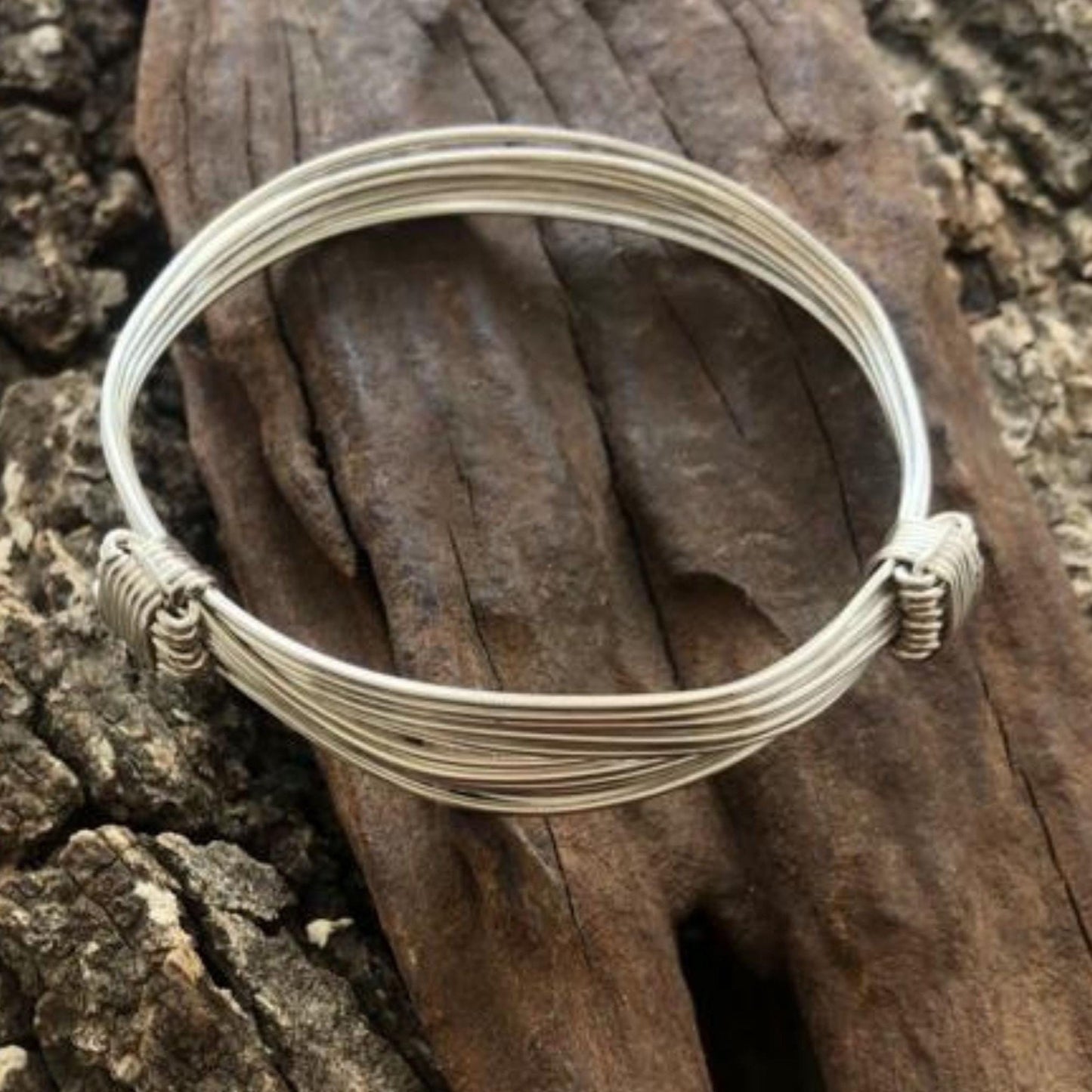 Two Knot Nine Strand Silver Elephant Knot Bangle