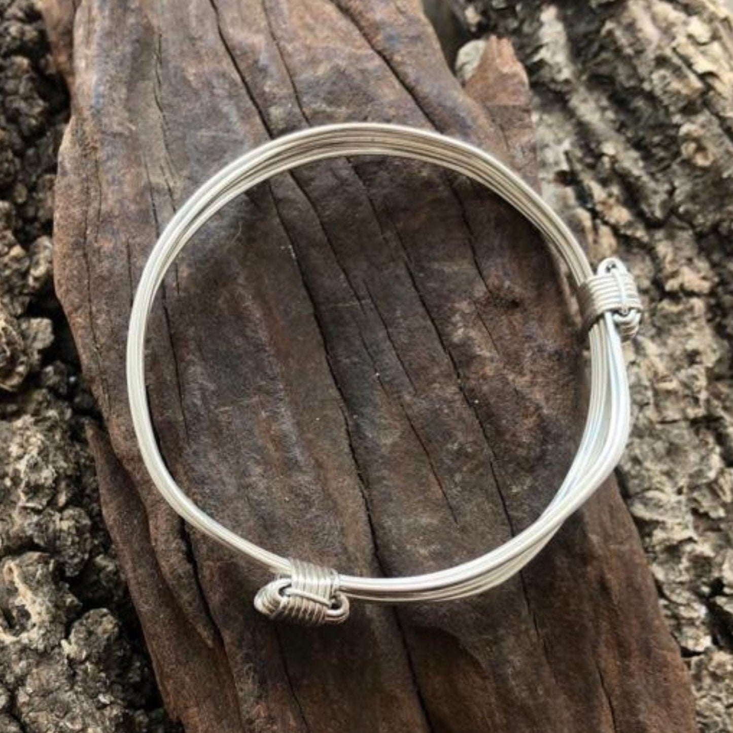 Two Knot Nine Strand Silver Elephant Knot Bangle